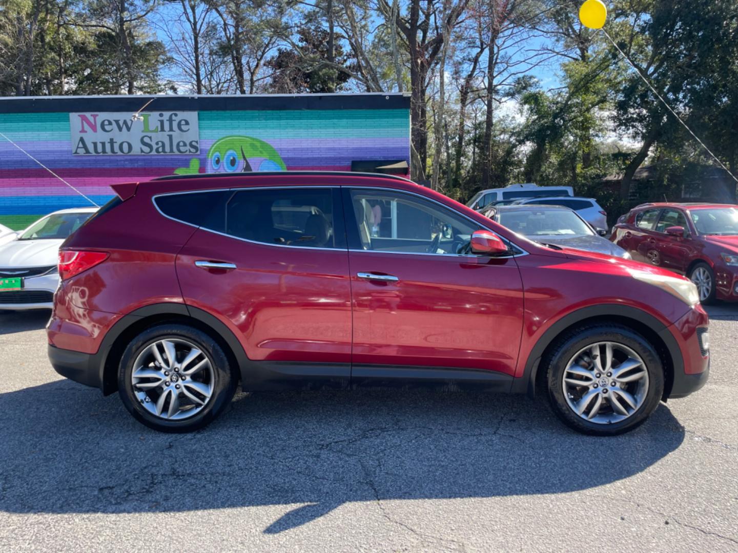 2013 RED HYUNDAI SANTA FE SPORT 2.0T (5XYZU3LA3DG) with an 2.0L engine, Automatic transmission, located at 5103 Dorchester Rd., Charleston, SC, 29418-5607, (843) 767-1122, 36.245171, -115.228050 - Leather, CD/AUX/Sat/Bluetooth, Dual Climate, Power Everything (windows, locks, seats, mirrors), Heated Seats, Rear Heated Seats, Push Button Start, Keyless Entry, Alloy Wheels. Local Trade-in!! Located at New Life Auto Sales! 2023 WINNER for Post & Courier's Charleston's Choice Pre-owned Car Dealer - Photo#7